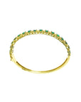 14K gold bangle bracelet with round cut bluish-green emeralds in square links with rope borders.