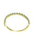 14K gold bangle bracelet with round cut bluish-green emeralds in square links with rope borders.