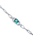 14K white gold paper clip bracelet with a square bluish-green emerald and diamond halo.