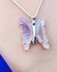Lavender agate butterfly pendant necklace with sterling silver setting.