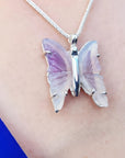 Lavender agate butterfly pendant necklace with sterling silver setting.