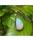 9.29 ct. Ethiopian opal pendant in 14K solid yellow gold, featuring a radiant white teardrop opal.
