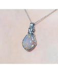 5.96 ct. Welo Ethiopian multicolor opal pendant with silver wire wrap on a silver chain.