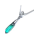 Big view of an emerald and diamond briolette necklace in 14k white gold with a natural diamond on top slider bail