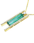 14K yellow gold necklace with a baguette-cut emerald, surrounded by natural diamonds, on a delicate chain.