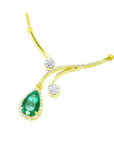 18K yellow gold necklace with a pear-shaped Colombian emerald, surrounded by diamonds, and diamond accents.