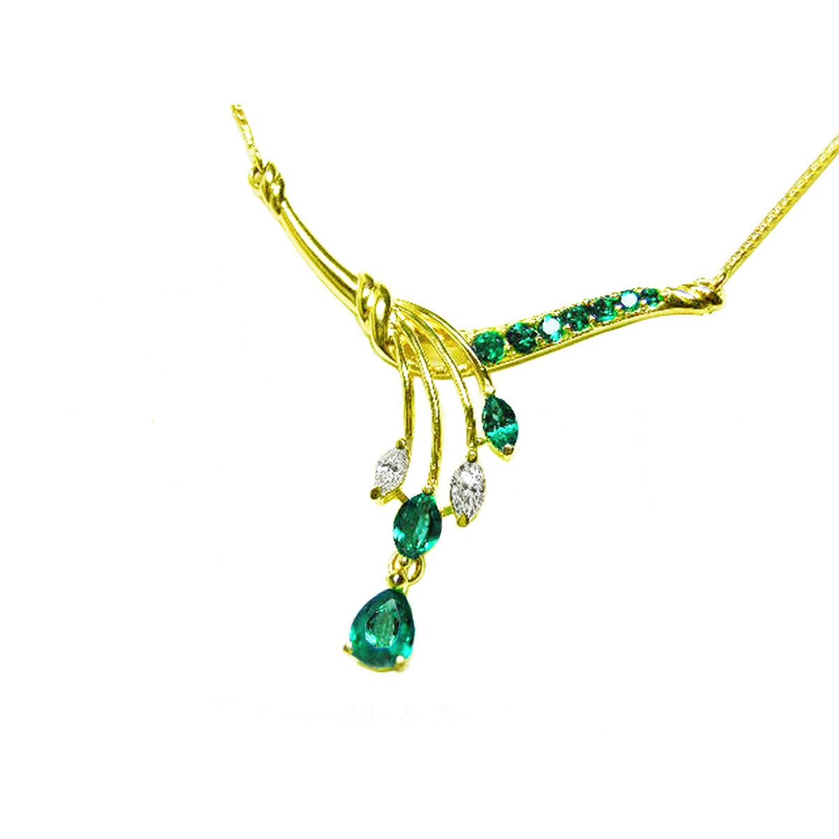 A left view of a yellow gold natural emerald and diamond necklace blended pear shaped marquises and round cuts