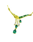 14K yellow gold necklace with marquise and pear shaped Colombian emeralds and diamonds.