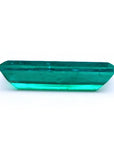 3.13 carat baguette cut Colombian emerald, sparkling bluish-green, eye-clean.
