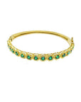 14K yellow gold bangle bracelet with round brilliant cut bluish-green emeralds in square links.