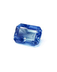 1.33 carats loose natural blue sapphire emerald-cut, left side position displaying table and crown