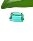 1.83 carat emerald-cut GIA certified Colombian emerald with a vibrant bluish-green hue.