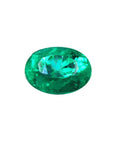 Natural loose Colombian emerald oval cut, face-up table and crown view