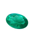 2.11 carat oval cut loose Colombian emerald, sparkling deep bluish-green.