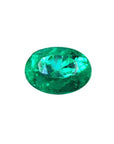 Natural loose Colombian emerald oval cut, medium-deep vibrant bluish green, very good brightness.