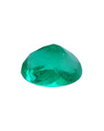 2.11 carat oval cut loose Colombian emerald with sparkling deep bluish-green color.