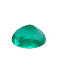 2.11 carat oval cut loose Colombian emerald with sparkling deep bluish-green color.
