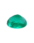 2.11 carat oval cut loose Colombian emerald with sparkling deep bluish-green color.