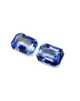 2.16 ct. Loose matching pair blue sapphires emerald-cut, left side position tables and crowns visibles