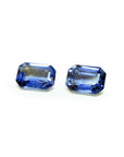 2.16 ct. Loose matching pair blue sapphires emerald-cut, left side position tables and crowns visibles