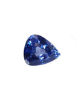 Vibrant medium blue, pear-shaped natural sapphire gemstone with sparkling facets.
