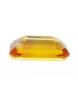 4.05 carats loose natural sapphire emerald-cut Intense yellow hue, upside down exposing pavilion