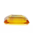 4.05 ct. vibrant intense yellow sapphire, rectangular emerald-cut loose gemstone.
