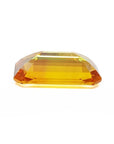 4.05 ct. vibrant intense yellow sapphire, rectangular emerald-cut loose gemstone.