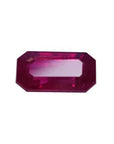 0.95 carat natural Burma ruby gemstone with a vibrant red hue and emerald cut.