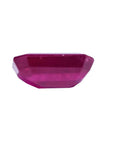 0.95 carat natural Burma ruby gemstone with a deep red hue and emerald cut.