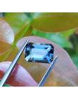 3.90 ct. untreated GIA certified sapphire, rectangular emerald-cut, blue changing to purple.