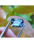 3.90 ct. untreated GIA certified sapphire, rectangular emerald-cut, blue changing to purple.