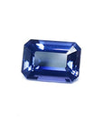 3.90 ct untreated GIA certified rectangular emerald-cut blue sapphire changing to purple.