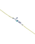 Emerald Love Bracelet: 14K yellow gold chain with "love" in white gold, featuring a round cut emerald.