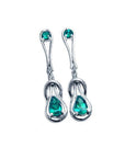 Pair of 14K white gold love knot emerald drop earrings with pear-shaped Muzo Colombian emeralds.