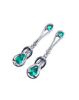 14K white gold love knot earrings with pear-shaped and round Colombian emeralds.