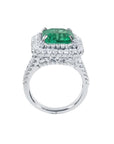 4.14 ct GIA-certified F1 Colombian emerald ring with diamond halo and band in 14K white gold.