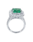 4.14 ct GIA-certified F1 Colombian emerald ring with diamond halo and band in 14K white gold.