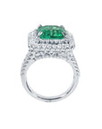 4.14 ct GIA-certified F1 Colombian emerald ring with diamond halo and band in 14K white gold.