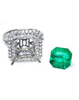 14K white gold diamond halo ring setting next to a loose, bright medium green Colombian emerald.