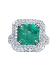 4.14 ct GIA F1 Colombian emerald ring with diamond halo and band in 14K white gold.