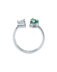 Toi et Moi ring features a half-moon-shaped natural Colombian emerald and a trillion-cut diamond, handcrafted in 18k solid white gold.