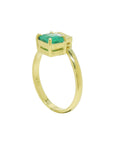 A handcrafted 18k yellow gold you and me or toi et moi emerald and diamond engagement ring.