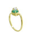A stunning You and Me emerald ring for women, set in a dazzling prong setting of 18k yellow gold.