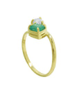A stunning You and Me emerald ring for women, set in a dazzling prong setting of 18k yellow gold.