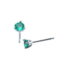 Pair of Martini emerald stud earrings with round green emeralds in 14K white gold, three-prong setting.