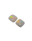 Pair of 5.45 ct. Australian solid square-cut opals with multicolor, flashing red-orange display.