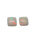 Pair of 5.45 ct. Australian loose solid square-cut opals with multicolor display, flashing red-orange.