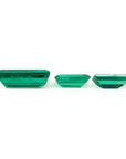 Matched trio set of baguette-cut natural loose Colombian emeralds in deep bluish-green.