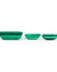 Matched trio set of baguette-cut natural loose Colombian emeralds in deep bluish-green.